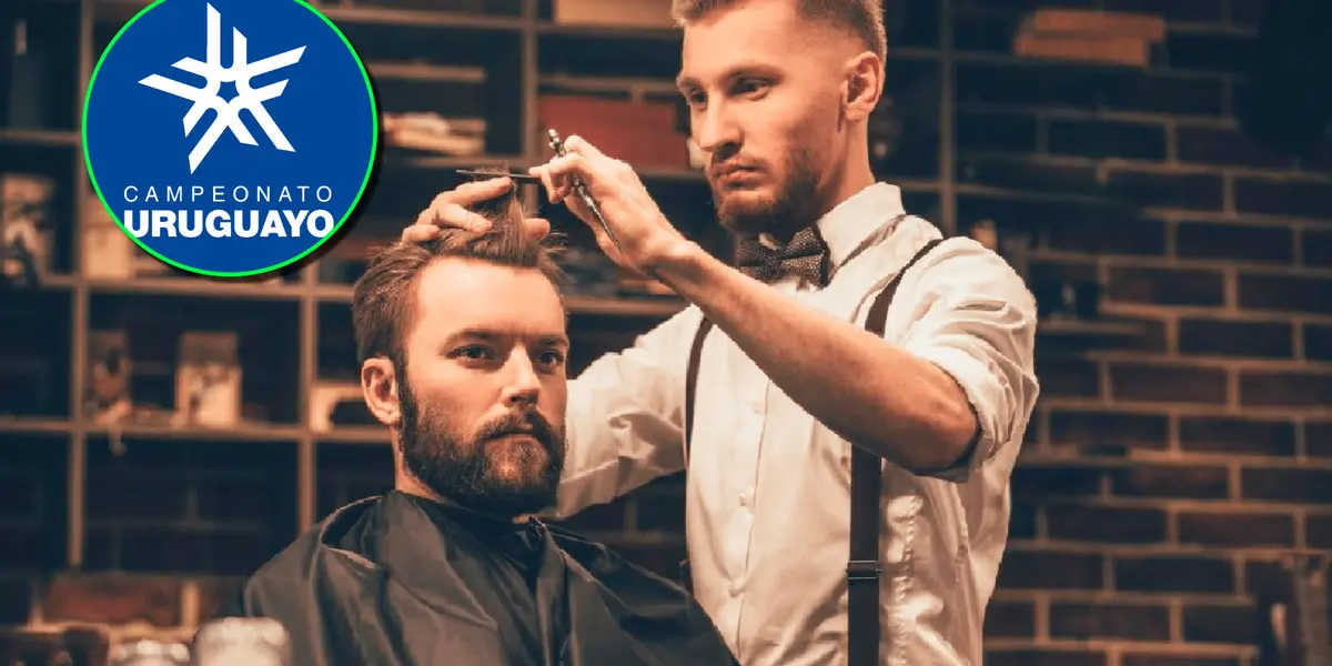 Barbero cortando el pelo junto al logo del Campeonato Uruguayo.