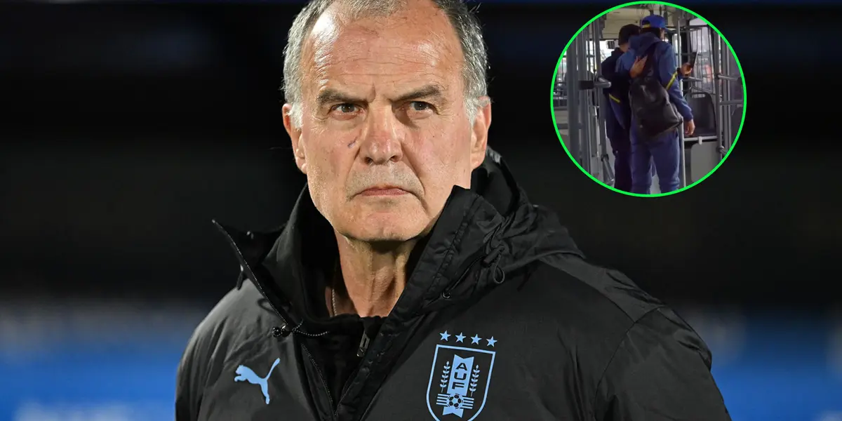 Marcelo Bielsa con la campera de Uruguay y Cavani de fondo.