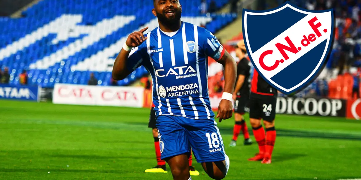 Morro García con la camiseta de Godoy Cruz y el escudo de Nacional.